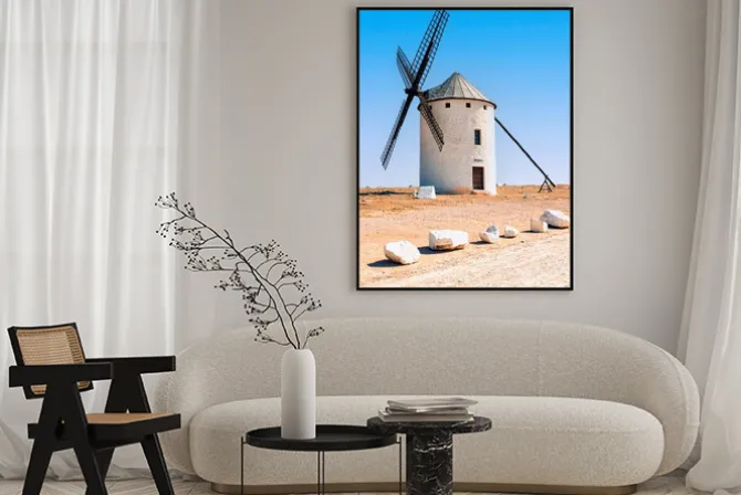 Plakat: Wiatrak na tle błękitnego nieba