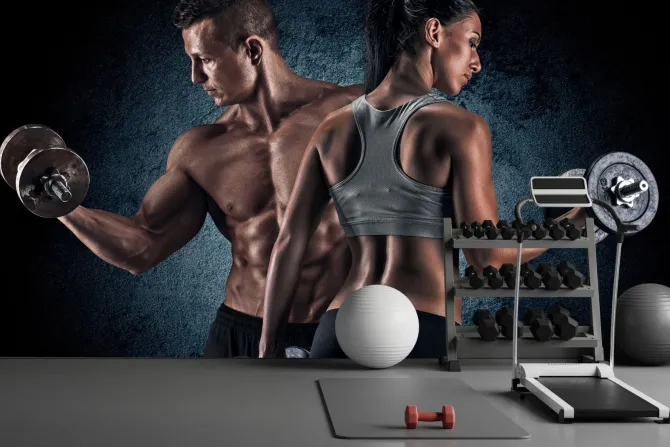 Plakat: Wysportowana para na siłowni