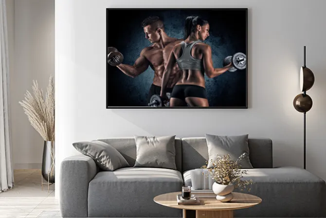 Plakat: Wysportowana para na siłowni